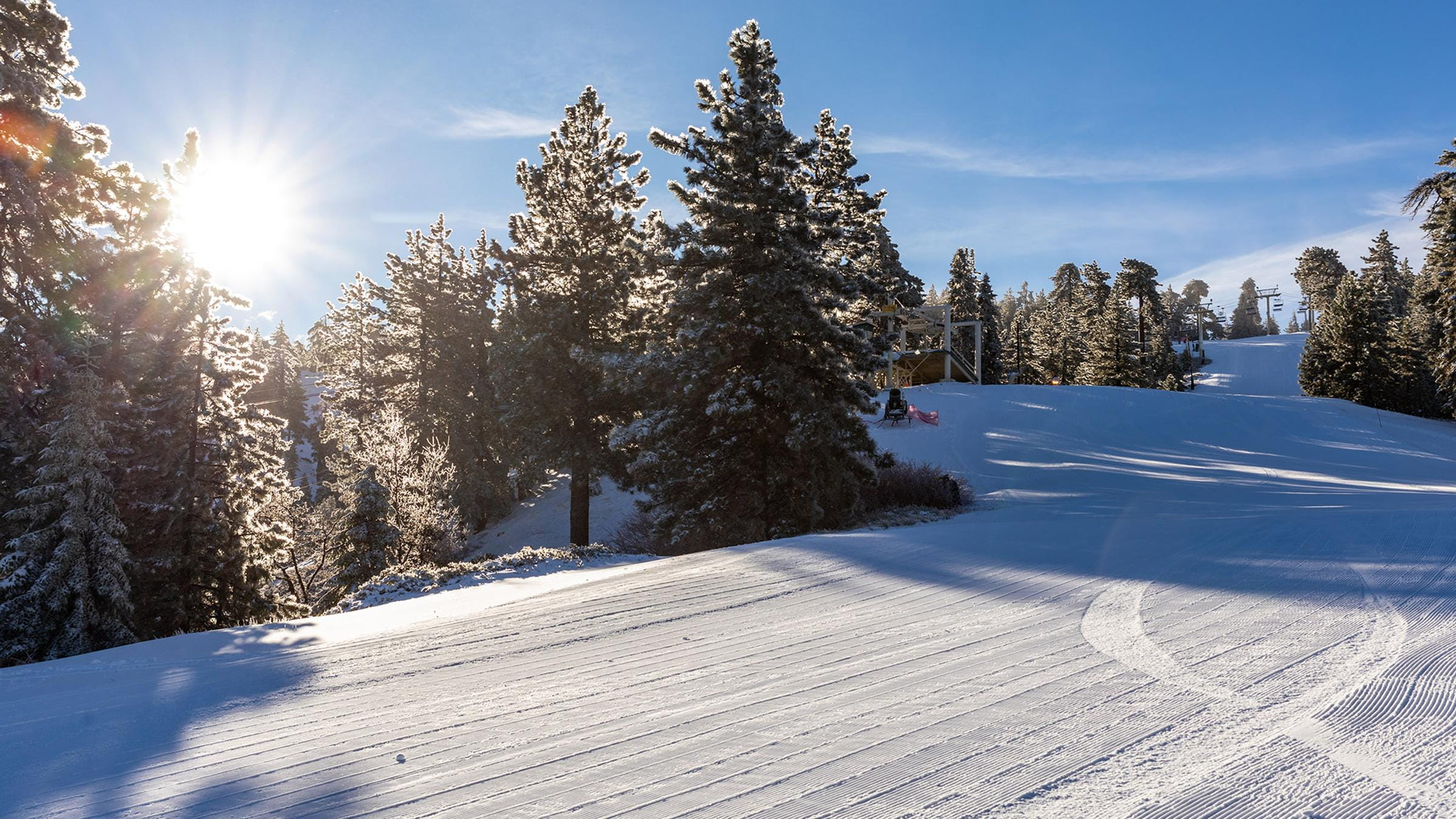 clean groomed ski trail in big bear on a sunny day